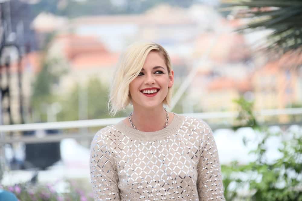 Kristen Stewart with her short blonde hair attends the 'Personal Shopper' photo-call during the 69th Cannes Film Festival 2016.