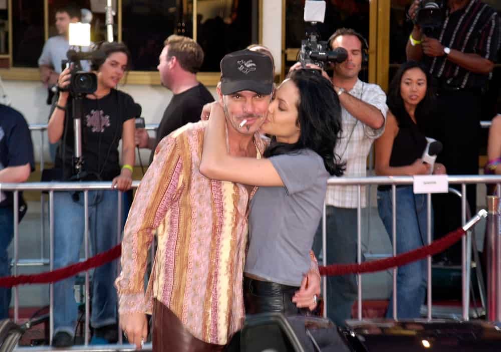 On June 5, 2000, Actress Angelina Jolie & actor husband Billy Bob Thornton were at the world premiere, in Westwood, of her new movie Gone In 60 Seconds. Jolie was wearing a casual outfit with her loose and tousled raven hairstyle.