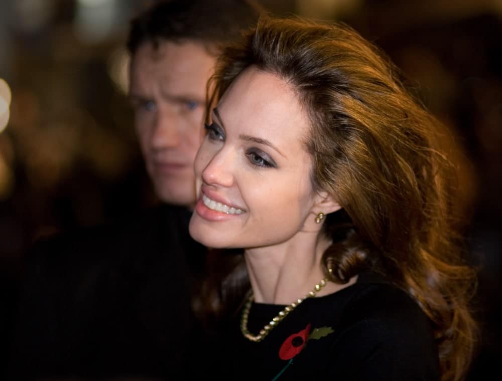 Angelina Jolie went with a vintage look to her long and brushed-back hair with curls at the tips at the European premiere of 'Beowulf' at the Vue Cinema on November 11, 2007 in London, England.