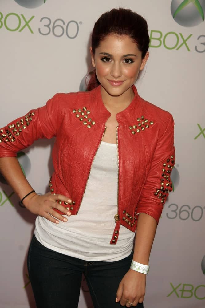 Ariana Grande kept it casual in a loose ponytail along with a white tank and red jacket at the World Premiere of "Project Natal" for XBOX 360 Imagined by Cirque Du Soleil on June 13, 2010.