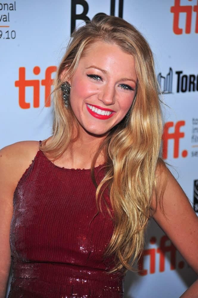 Blake Lively's shiny red sequined dress went perfectly well with her loose and tousled sandy blond waves at "The Town" Premiere Screening at Toronto International Film Festival in Toronto back in September 11, 2010.