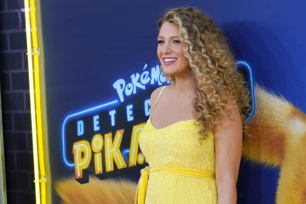 Blake Lively attended the premiere of "Pokemon Detective Pikachu" in Times Square last May 2, 2019. She wore an elegant and sexy canary yellow dress that suits her long curly highlighted hair quite well.