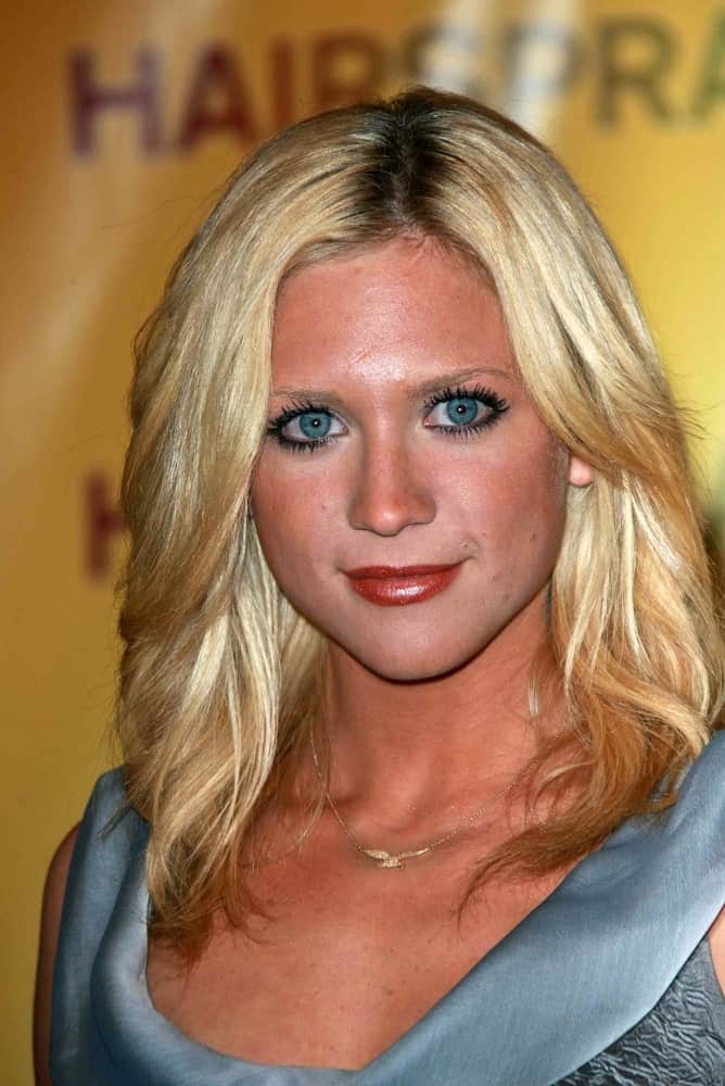 Brittany Snow was at the ShoWest 2007 Photocall for Hairspray in Paris Hotel, Las Vegas, NV on March 14, 2007. She paired her gray dress with her bronzed skin and shoulder-length layered blonde hairstyle with a slight tousle.