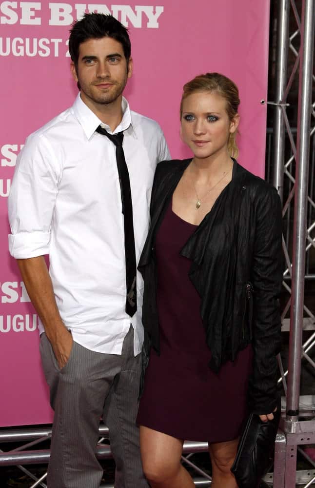 Brittany Snow attended the Los Angeles premiere of 'The House Bunny' held at the Mann Village Theater in Westwood on August 20, 2008. She wore a dress and a black leather jacket with her highlighted blonde ponytail hairstyle with a slick finish.