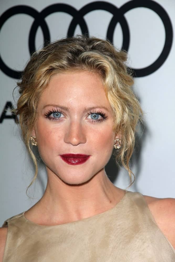 Brittany Snow attended the Audi and Derek Lam Kick Off Emmy Week 2012, Cecconi's, West Hollywood, CA on September 16, 2012. She wore a chraming beige dress with her messy and curly sandy blonde bun hairstyle.