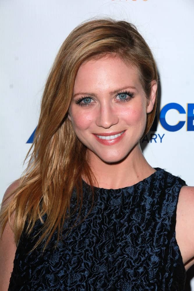 Brittany Snow attended the DirecTV's "Full Circle" Season 2 Premiere at the The London on March 16, 2015 in West Hollywood, CA. She paired her dark dress with a medium-length layered and side-swept brunette hairstyle that has long side-swept bangs.