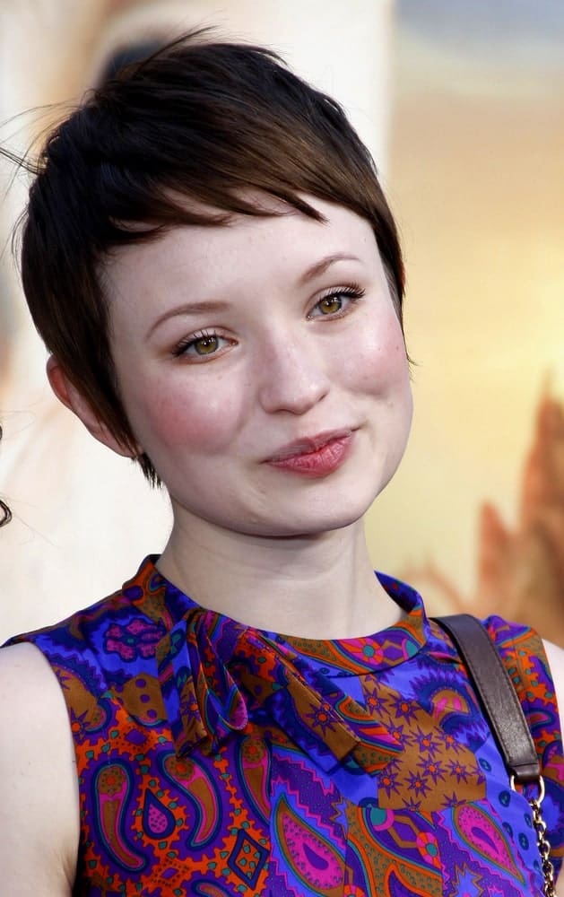 Emily Browning attended the Los Angeles premiere of 'Legends of the Guardians: The Owls of Ga'Hoole' held at the Grauman's Chinese Theater in Hollywood on September 19, 2010. She wore a lovely colorful dress to match her short pixie brunette hairstyle that has side-swept short bangs.