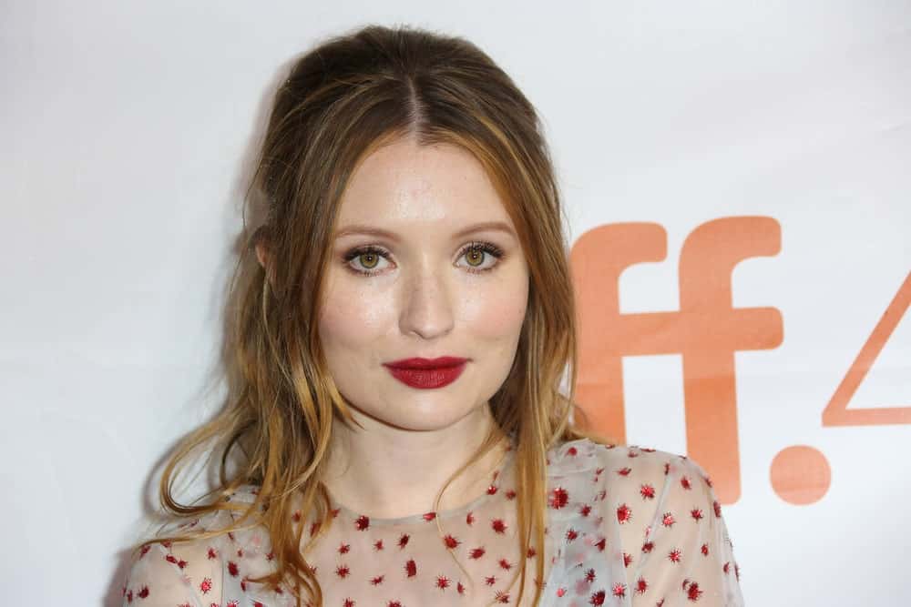 Actress Emily Browning attended the 'Legend' premiere during the 2015 Toronto International Film Festival at Roy Thomson Hall on September 12, 2015 in Toronto, Canada. She was seen wearing a lovely patterned dress to pair with her highlighted and tousled half-up brunette hairstyle that has long side-bangs.