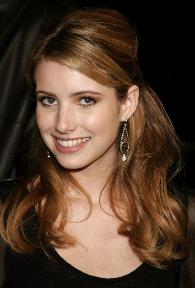 Emma Roberts attended the Los Angeles Premiere of "Music and Lyrics" held at the Grauman's Chinese Theater in Hollywood, California on February 7, 2007. She was seen in a black dress with her long and layered half-up brunette hairstyle.