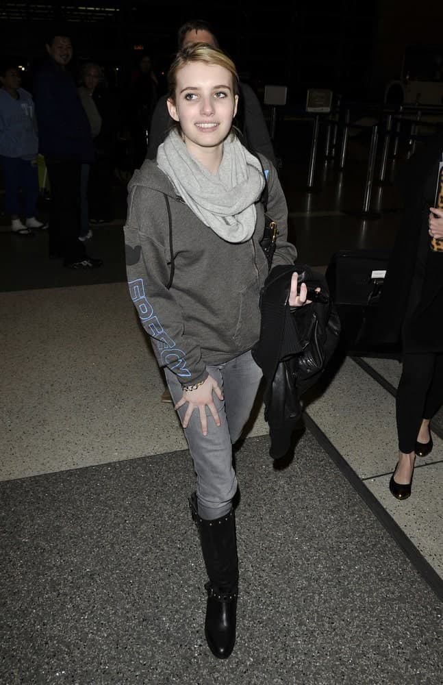 Actress Emma Roberts was seen at LAX (Los Angeles Airport) on February 9, 2010 in Los Angeles, California. She was seen wearing a casual outfit with her neat bun hairstyle with side-swept bangs.