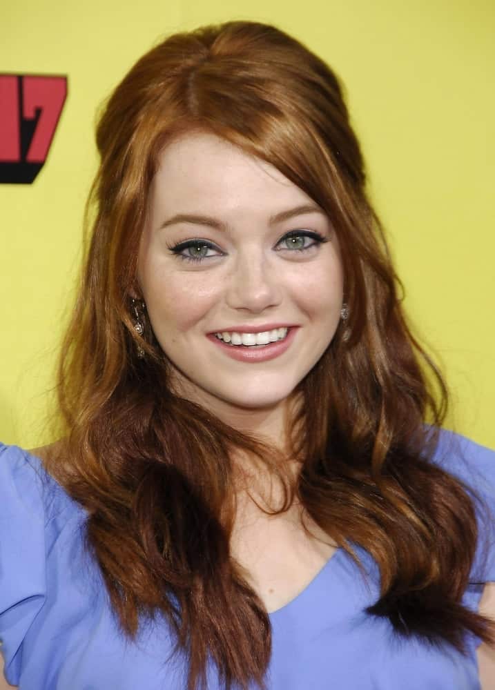 Emma Stone attended the Premiere of SUPERBAD held at the Grauman's Chinese Theatre in Los Angeles, CA on August 13, 2007. She wore a simple blue outfit to go with her medium-length layered half up hairstyle.
