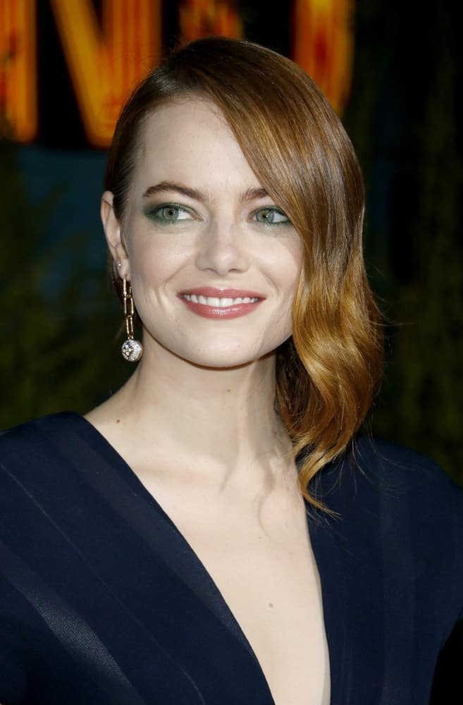 Actress Emma Stone was at the Los Angeles premiere of 'Zombieland Double Tap' held at the Regency Village Theatre in Westwood on October 10, 2019. She was stunning in her navy blue outfit that complemented her stylish side-swept waves.