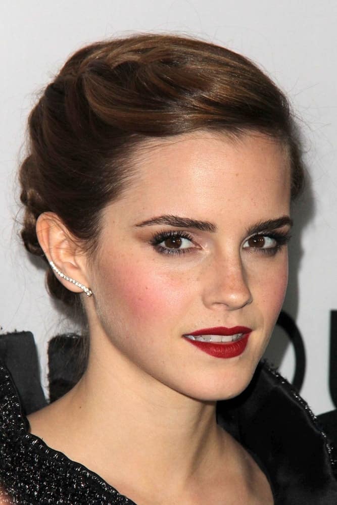 Emma Watson was at the "The Bling Ring" Los Angeles Premiere at the DGA Theater on June 4, 2013 in Los Angeles, CA. Her lovely red lips paired well with her black outfit and elegant upstyle incorporated with braids.