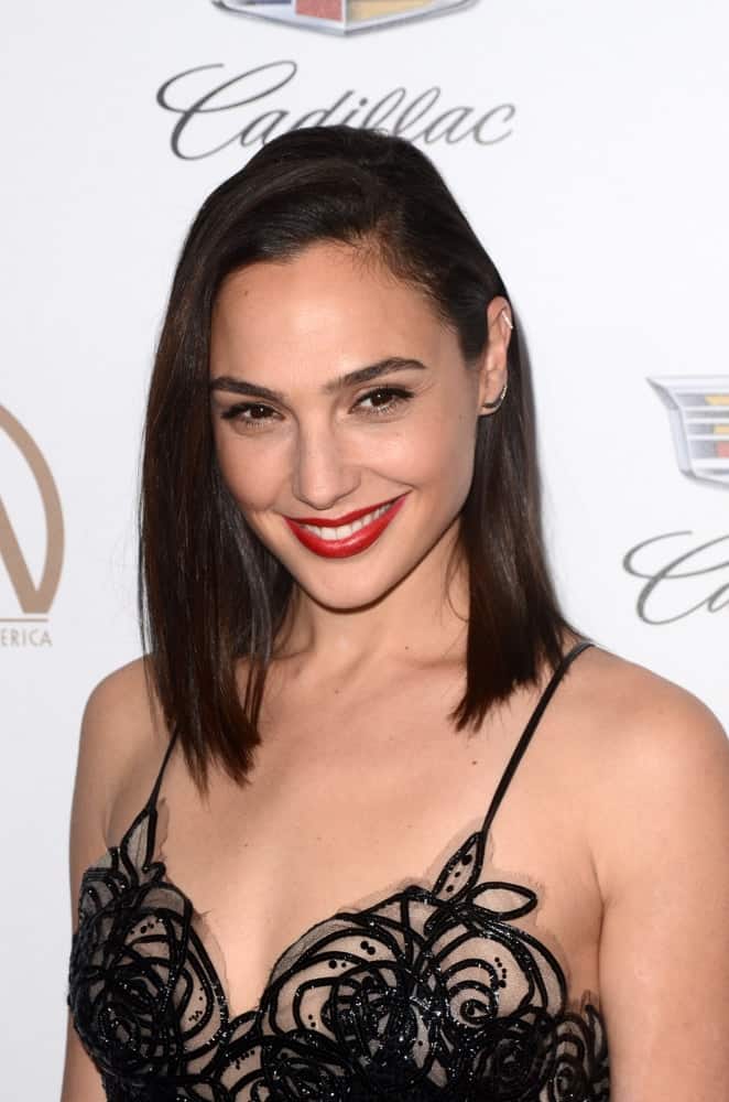 Gal Gadot was at the Producers Guild Awards 2018 at the Beverly Hilton Hotel on January 20, 2018 in Beverly Hills, CA. She came in a detailed black dress that pairs perfectly with her shoulder-length straight dark hairstyle with a side-swept finish.