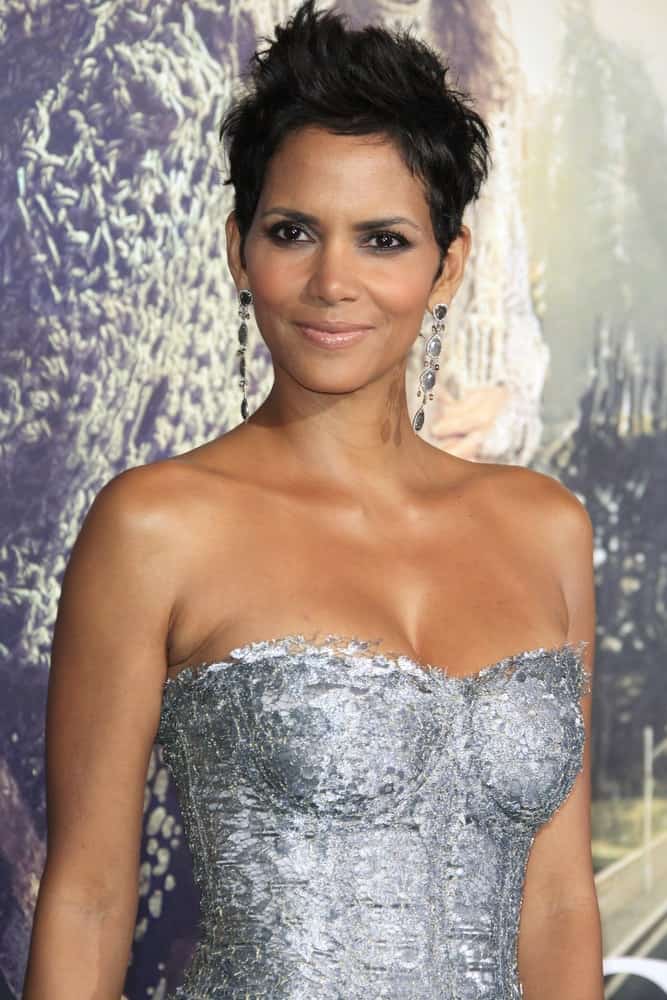 Halle Berry emphasized her lovely neckline with a strapless silver dress and a spiked pixie hairstyle that has a slight side-swept finish at the Warner Bros. Pictures' 'Cloud Atlas' premiere at Grauman's Chinese Theater on October 24, 2012 in Los Angeles, California.