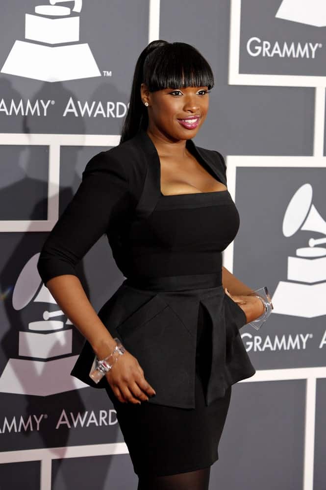 Jennifer Hudson attended the 52nd Annual Grammy Awards held at Staples Center in Los Angeles, California on January 31, 2010. She came in a black dress that she paired iwth a long raven ponytail hairstyle with blunt bangs.