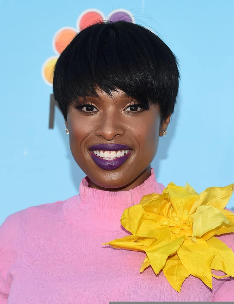 Jennifer Hudson was at the "Hairspray Live" FYC Event on June 9, 2017 in North Hollywood, CA. SHe went with a colorful outfit and colorful makeup with her raven bowl cut pixie hairstyle.
