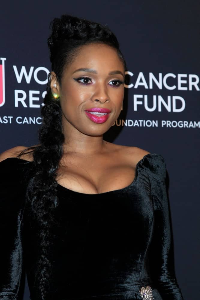 Jennifer Hudson was at the An Unforgettable Evening at Beverly Wilshire Hotel on February 27, 2018 in Beverly Hills, CA. She wore a stunning black velvet dress with her long raven fishtail braid ponytail.