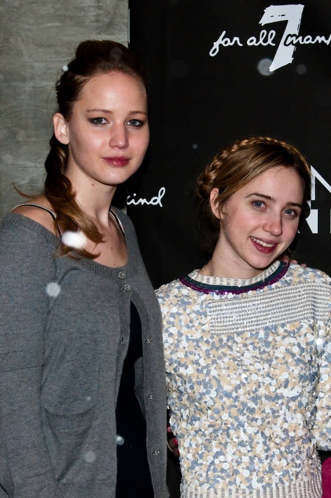 Actresses Jennifer Lawrence and Zoe Kazan attended the GenArt 7 Fresh Faces in Film at the Sky Lodge on January 22, 2010 in Park City, Utah. She wore a dark low ponytail hairstyle that has a slight pompadour look with her winter outfit.