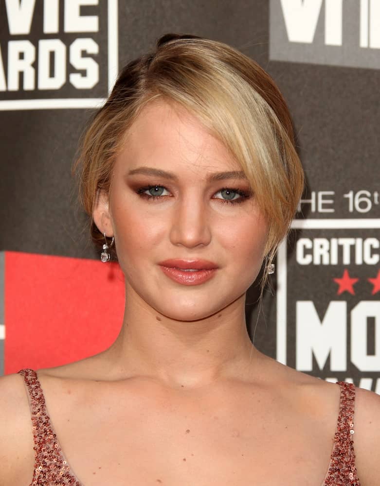 Jennifer Lawrence's sexy sequined dress was a perfect match for her bun hairstyle that has loose side-swept bangs and highlights at the 16th Annual "Critics" Choice Movie Awards on January 14, 2011 in Los Angeles, CA.
