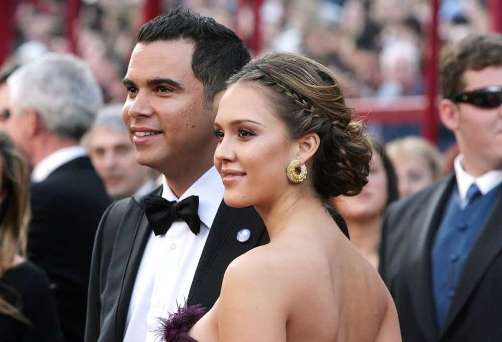 Cash Warren and Jessica Alba were at the 80th Annual Academy Awards Oscars Ceremony held at The Kodak Theatre in Los Angeles, on February 24, 2008. Alba wore Cartier earrings to match her elegant bun hairstyle that has braids incorporated within.