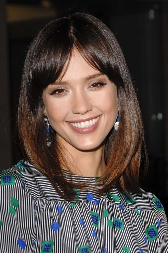 Jessica Alba wore vintage earrings from House of Lavande at the SUGAR Premiere held at the Pacific Design Center in Los Angeles, CA on March 18, 2009. She paired this with a straight shoulder-length layered hairstyle that has a loose and highlighted finish.
