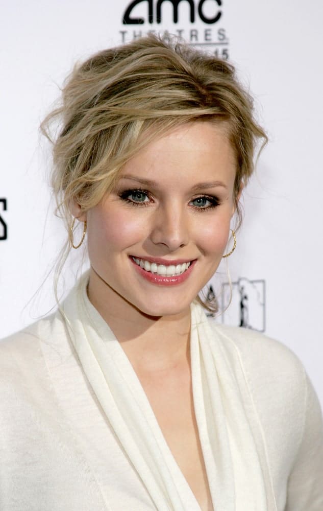 Kristen Bell exhibited a glamorous look with her messy highlighted upstyle hairstyle at the Los Angeles premiere of 'The Producers' held at the Westfield Century City on December 12, 2005.