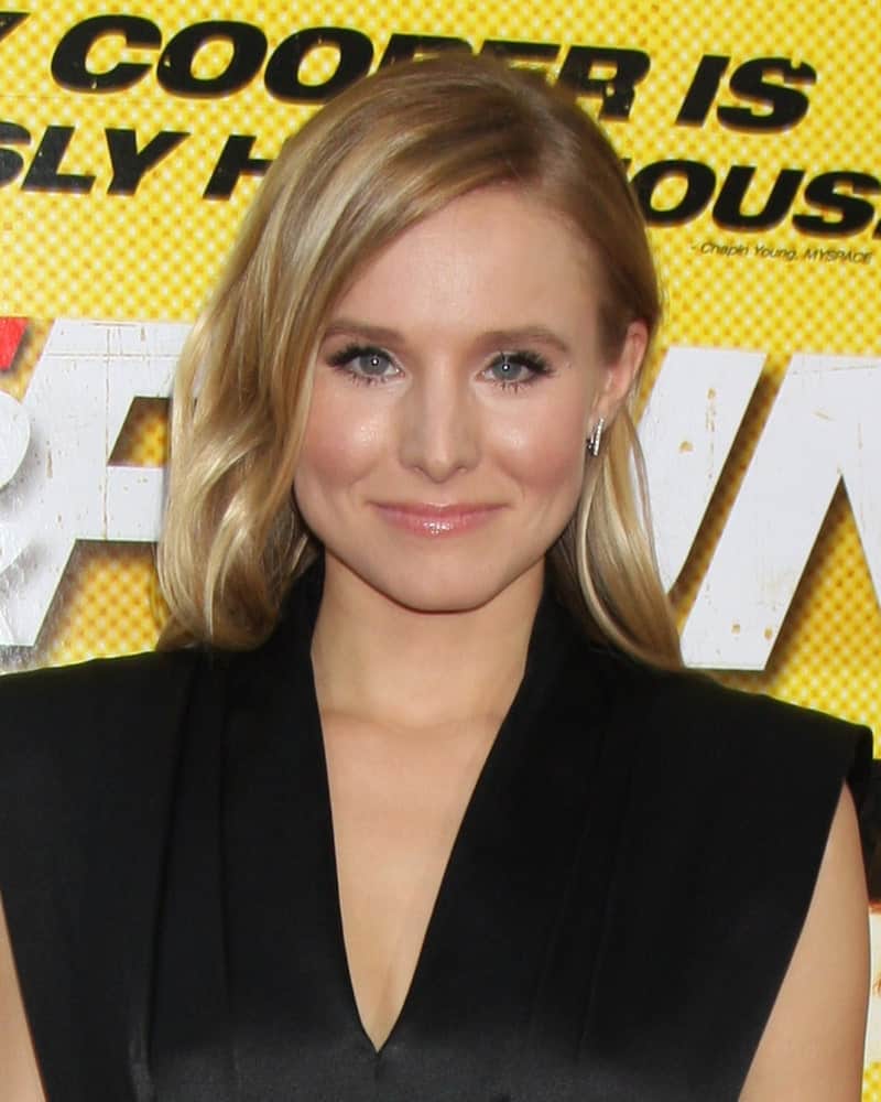 Kristen Bell made an appearance at the "Hit & Run" Los Angeles Premiere at Regal Cinema on August 14, 2012, sporting a simple loose highlighted hairstyle paired with a black dress.