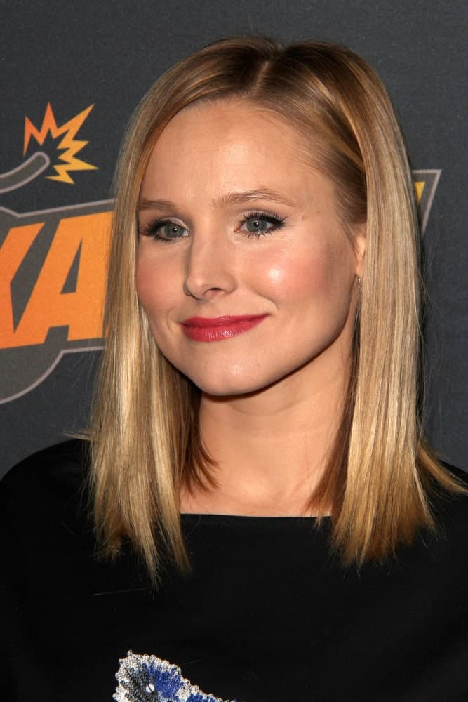 Kristen Bell wore a simple straight side-parted hairstyle at the "The Hobbit: The Desolation Of Smaug" Expansion Pack Game Launch at Eveleigh on December 11, 2013.