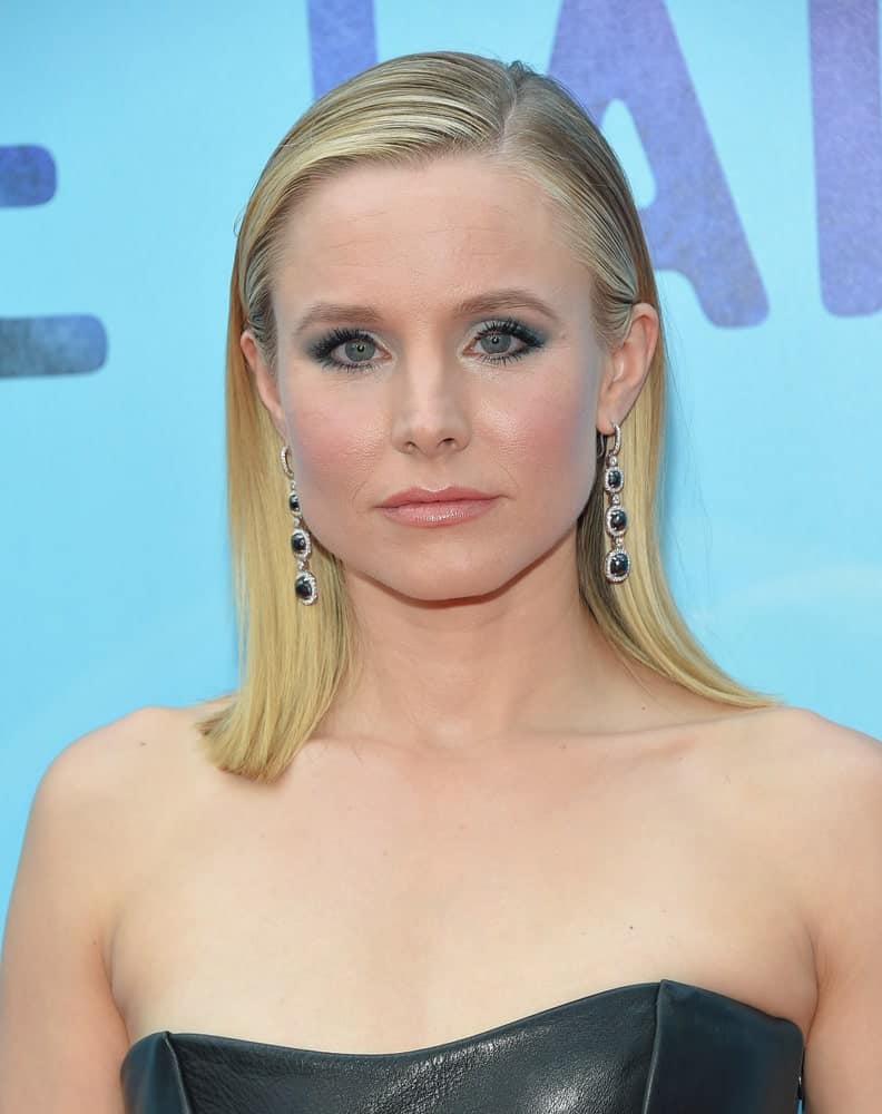 Kristen Bell exhibited a sultry look showcasing her slick side-parted hair and a black leather dress at the 'Like Father' Los Angeles Premiere on July 31, 2018, in Hollywood, CA