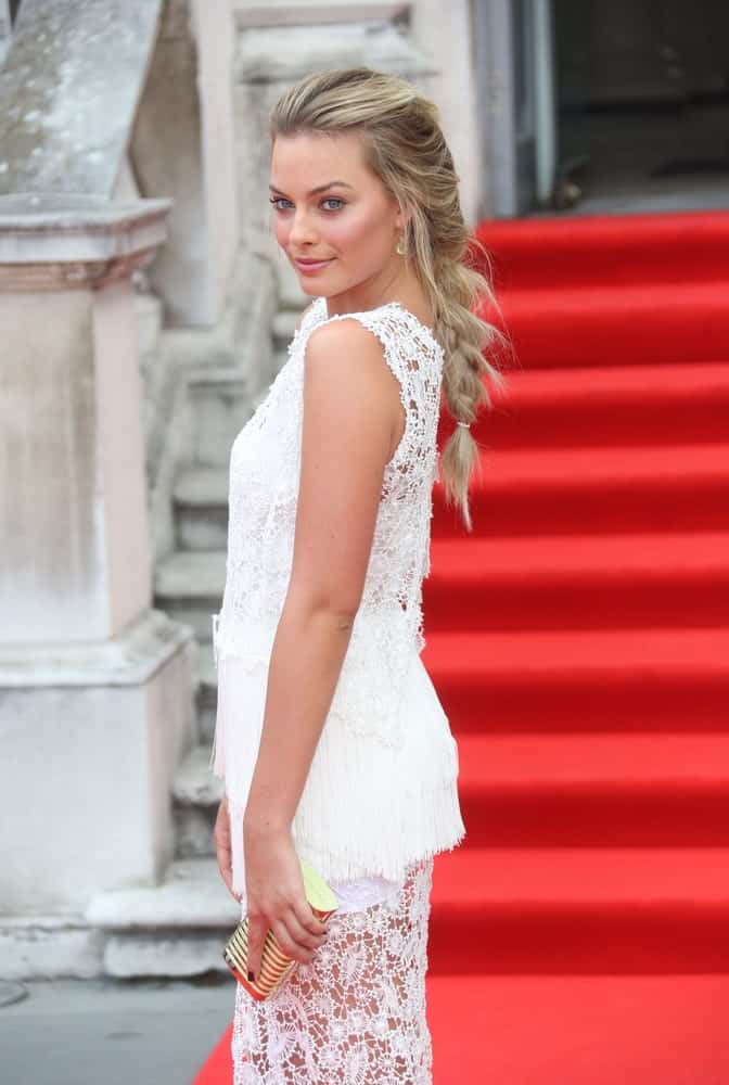 Margot Robbie flaunted her long blonde tresses arranged into a fishtail braid at the About Time UK Premiere held at Somerset House, London on August 8, 2013.