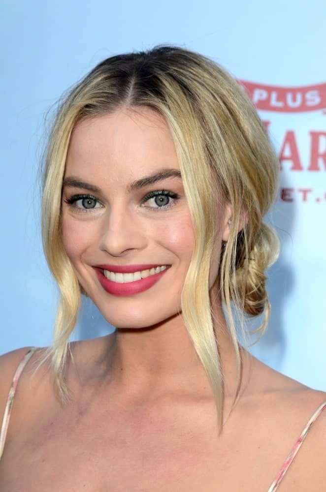 On February 3, 2018, Margot Robbie arrived for the "Peter Rabbit" Premiere at the Pacific Theaters at The Grove. She wore a messy loose bun hairstyle incorporated with tendrils.
