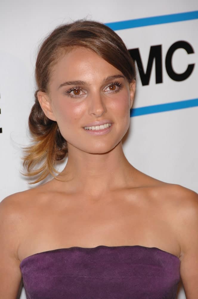 A slightly bronzed Natalie Portman wore a strapless dress and a messy low bun hairstyle with side-swept bangs at the American Cinematheque Gala at the Beverly Hilton Hotel on October 13, 2007 in Los Angeles, CA.