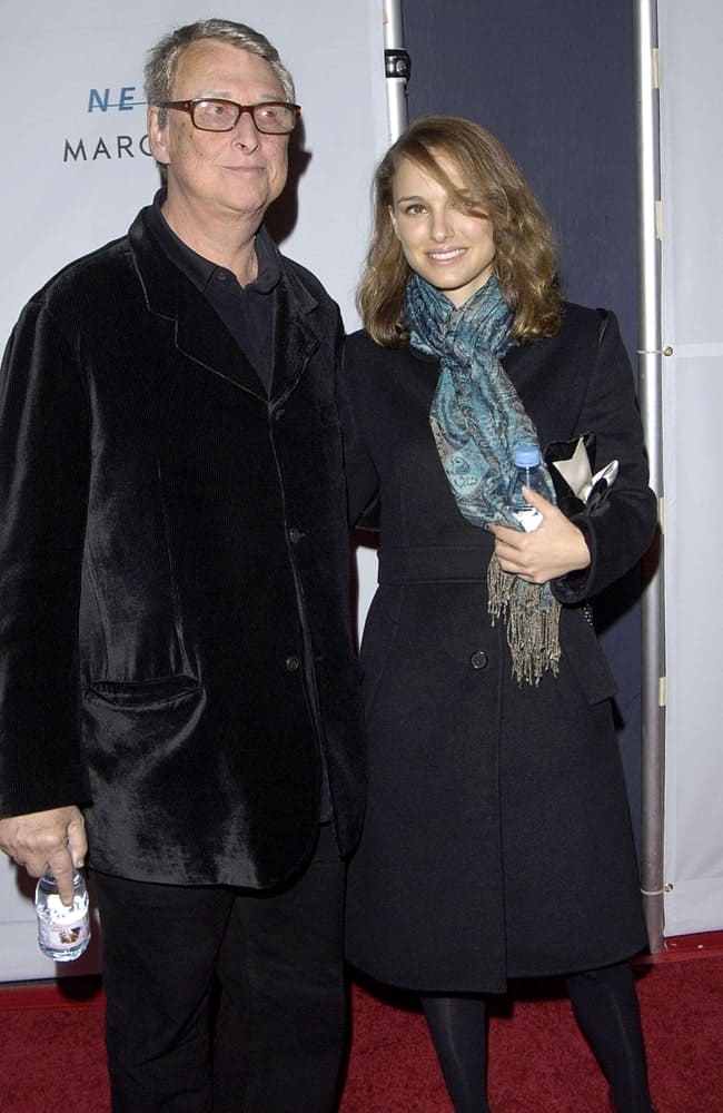 Mike Nichols and Natalie Portman were at the YOUNG FRANKENSTEIN Opening Night on Broadway at the Hilton Theatre, New York, NY on November 08, 2007. She wore a scarf and black coat with her loose brown shoulder-length hairstyle with side-swept bangs and a slight tousle.