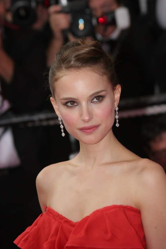 Natalie Portman's beautiful diamond earrings were on full display with her strapless red dress and elegant upstyle with a slick finish at the 'Che' Premiere at the Palais des Festivals during the 61st Cannes International Film Festival on May 21, 2008 in Cannes, France.