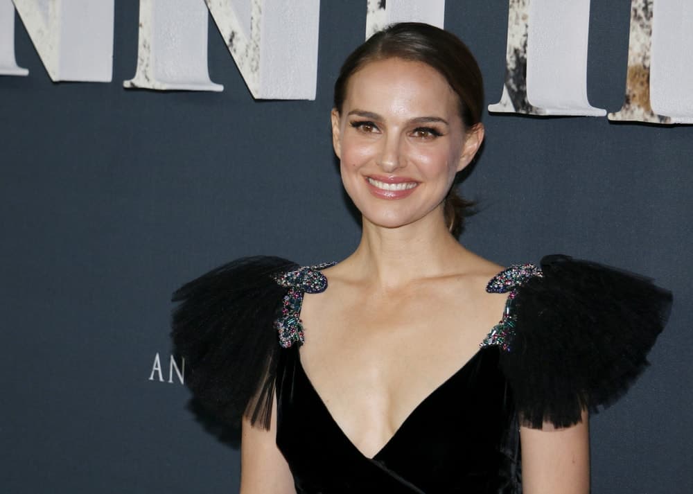 Natalie Portman wore a fashionable black dress with frills on the side to match her simple side-parted low ponytail and make-up at the Los Angeles premiere of 'Annihilation' held at the Regency Village Theater in Westwood, USA on February 13, 2018.
