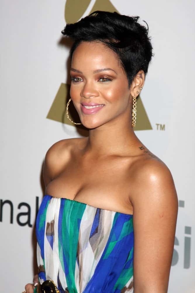 Rihanna was at the Pre-Grammy Party honoring Clive Davis at the Beverly Hilton Hotel in Beverly Hills, CA on February 7, 2009. She was lovely in her colorful dress that paired well with her neat black side-swept pixie hairstyle.