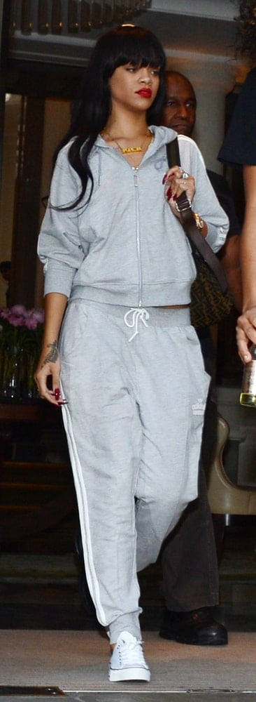 Rihanna was spotted leaving the Corinthia Hotel wearing a 'Rick' necklace in London, UK on June 25, 2012. This complements her casual sporty gray outfit and long tousled loose raven hairstyle with blunt bangs.