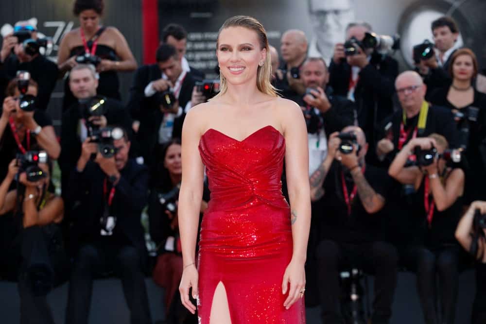 Scarlett Johansson was perfectly breathtaking in her sexy red dress and slicked-back shoulder-length straight hair when she attended the premiere of the movie "Marriage Story" during the 76th Venice Film Festival on August 29, 2019 in Venice, Italy.