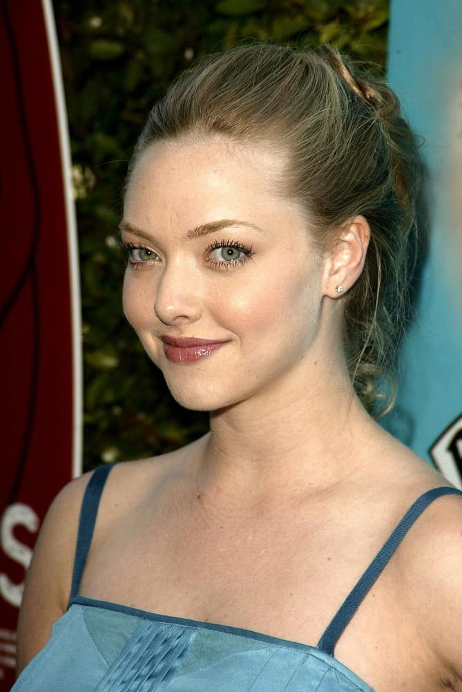 Amanda Seyfried wowed everyone with her lovely smile and messy high bun hairstyle that has loose tendrils at the "Nine Lives" Los Angeles Film Festival Centerpiece Premiere held at the Academy Theater in Los Angeles, CA on June 21, 2005.