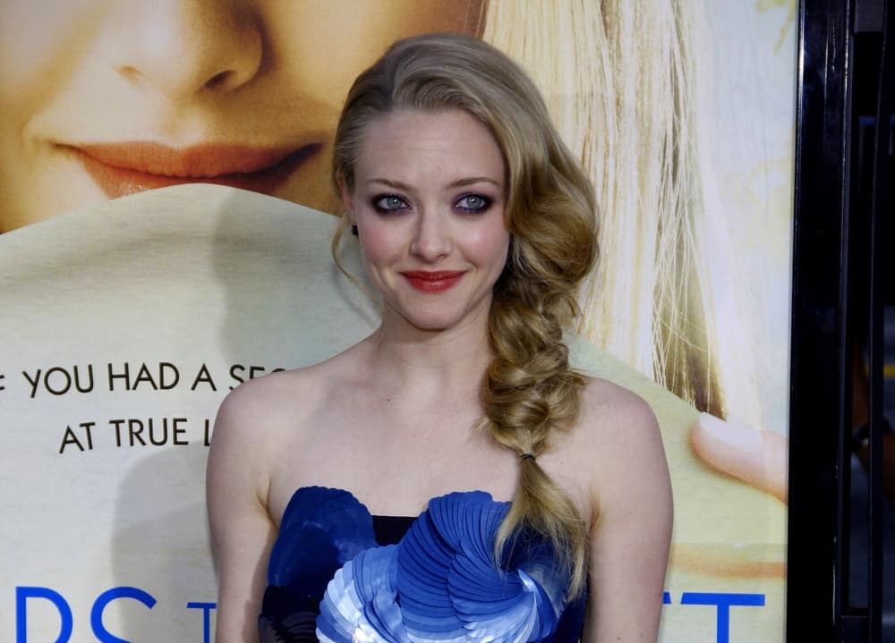 Amanda Seyfried was at the Los Angeles premiere of 'Letters To Juliet' held at the Grauman's Chinese Theater in Hollywood on May 11, 2010. She wore a beautiful blue strapless dress that she paired with a loose side-swept hairstyle that ends in a fishtail braid.