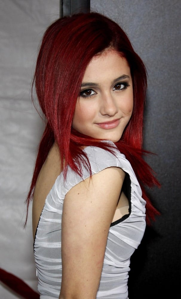 Ariana Grande flaunts her straight, vibrant red hair during the Los Angeles Premiere of "The Lovely Bones" held on July 12, 2009.
