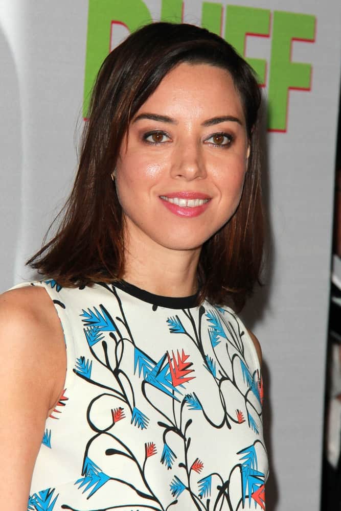 Aubrey Plaza was at the "The Duff" Los Angeles Premiere at a TCL Chinese 6 Theaters on February 12, 2015 in Los Angeles, CA. She was lovely in a colorful floral dress that went well with her shoulder-length dark bob hairstyle with a slight tousle.