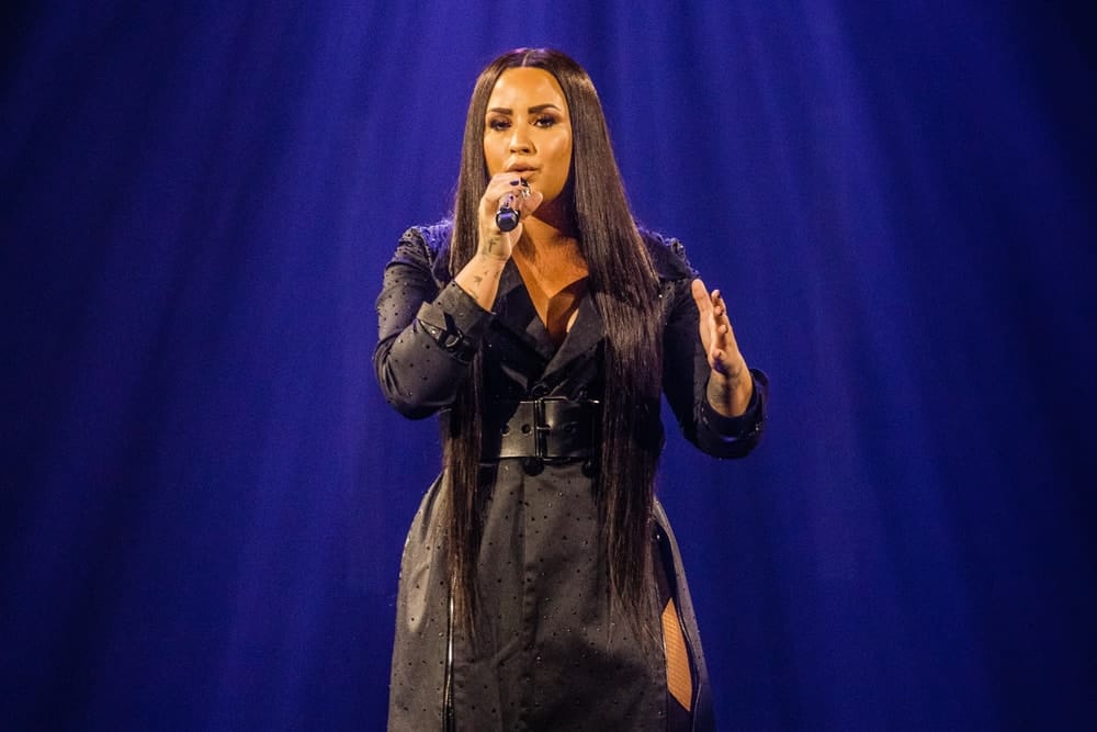 Demi Lovato performed on stage on June 18, 2018 at the AFAS Live in Amsterdam. She wore an all-black outfit that she paired with her super long and straight black hairstyle that reaches all the way to her hips.