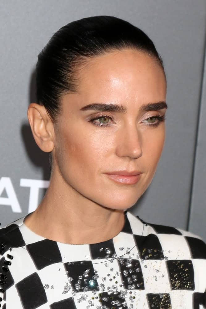 Jennifer Connelly attended the "American Pastoral" Special Screening at the Samuel Goldwyn Theater on October 13, 2016 in Beverly Hills, CA. She wore a lovely checkered dress with her slicked-back raven bun hairstyle.