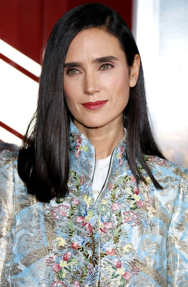 Jennifer Connelly attended the Los Angeles premiere of 'Only The Brave' held at the Regency Village Theatre in Westwood on October 8, 2017. She wore a floral dress with her long and tousled straight hairstyle that is slightly side-swept.