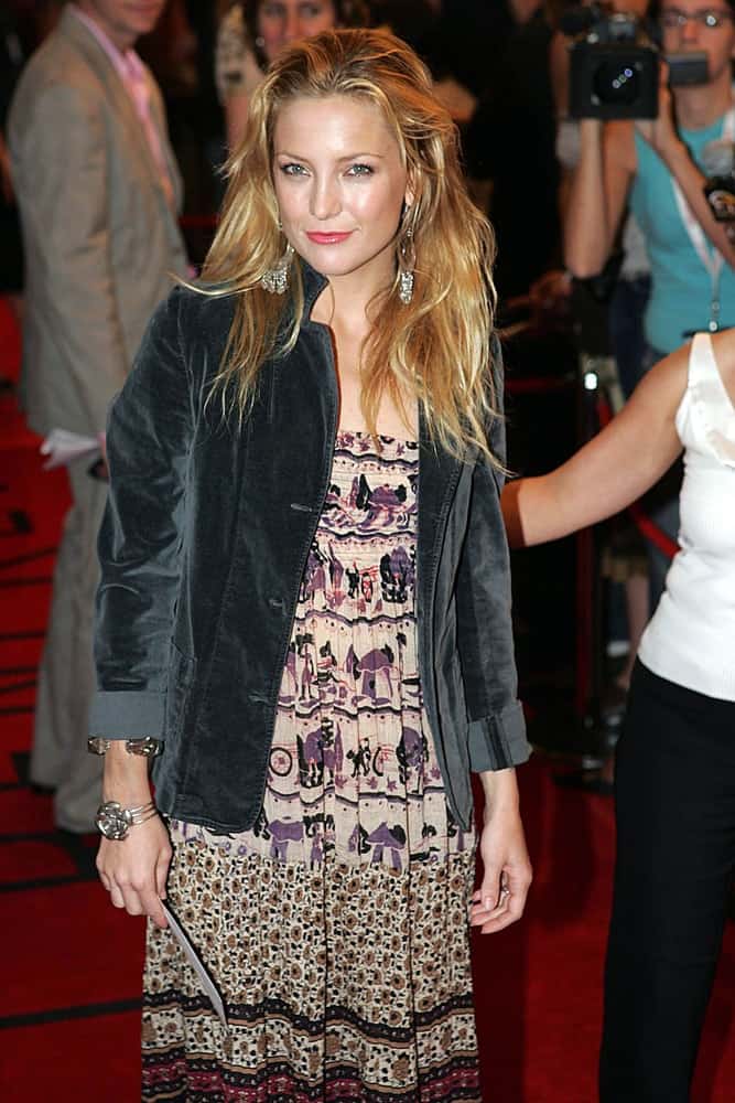 Kate Hudson attended the ELIZABETHTOWN Premiere at the Toronto Film Festival held at the Roy Thomson Hall in Toronto, ON on September 10, 2005. She wore a casual denim jacket with her casual dress and tousled highlighted sandy blond hairstyle.