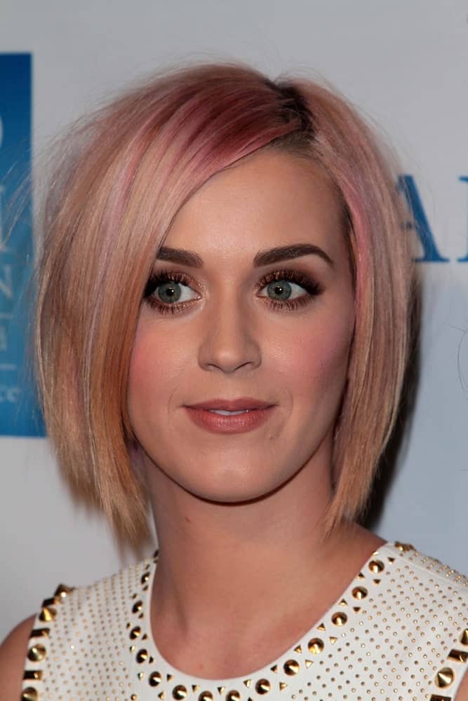 Katy Perry opted for a short layered bob in light pink during the 3rd Annual "Change Begins Within" Benefit Celebration on December 3, 2011.