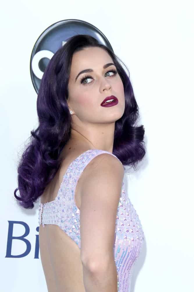 Katy Perry attended the 2012 Billboard Awards at MGM Garden Arena on May 20, 2012 sporting her dark purple curls paired with a sexy gown.