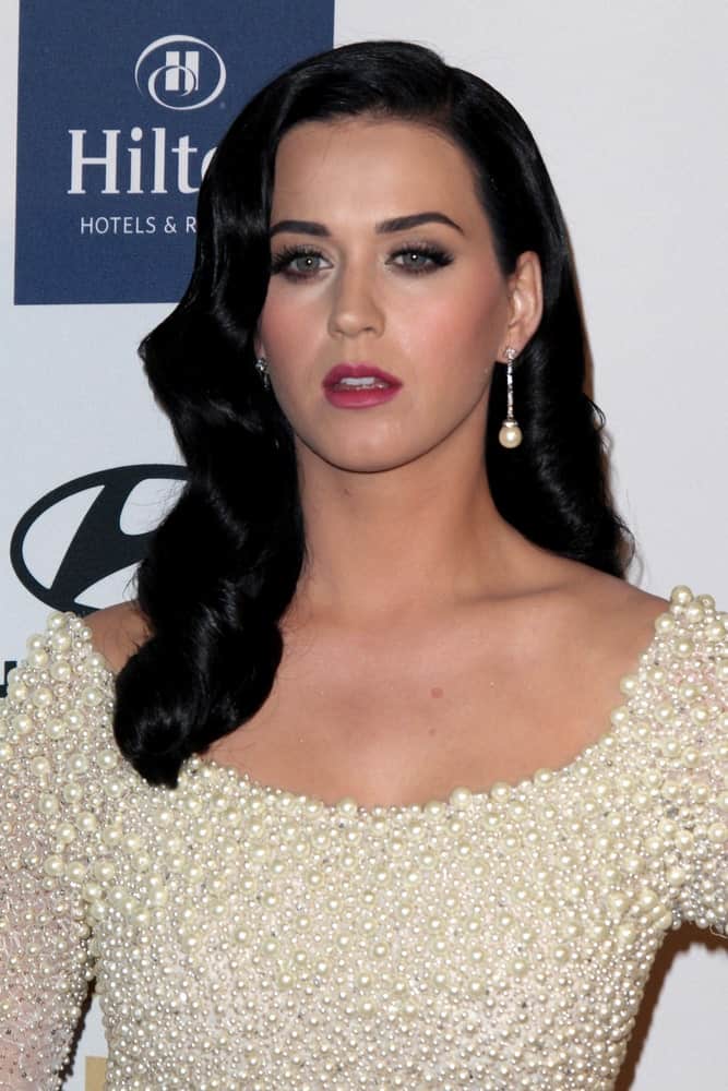 Katy Perry overflowed with posh and class in this beaded gown along with her vintage raven curls during the Clive Davis 2013 Pre-GRAMMY Gala at the Beverly Hilton Hotel on February 9, 2013.